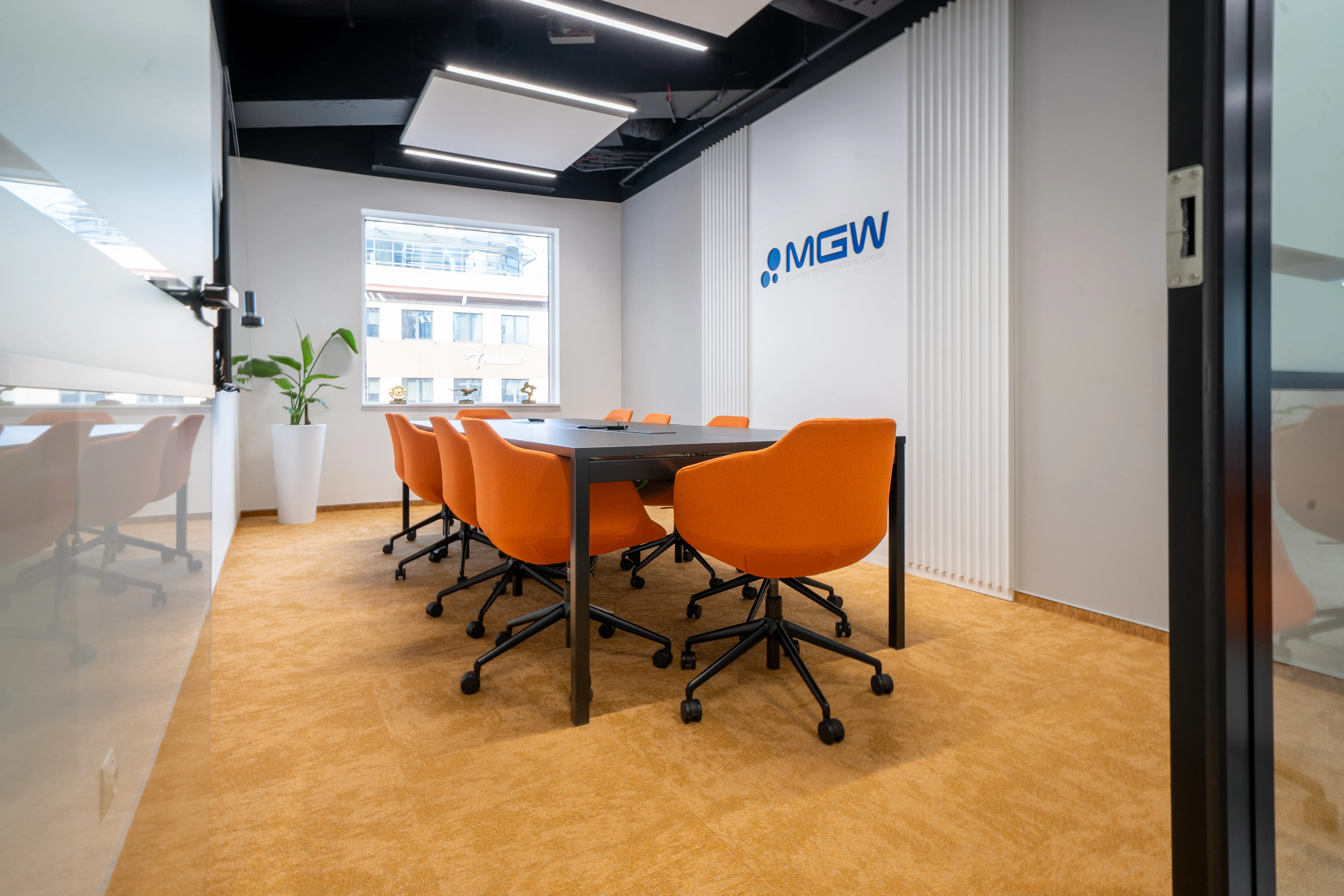 MGW - conference room with orange chairs